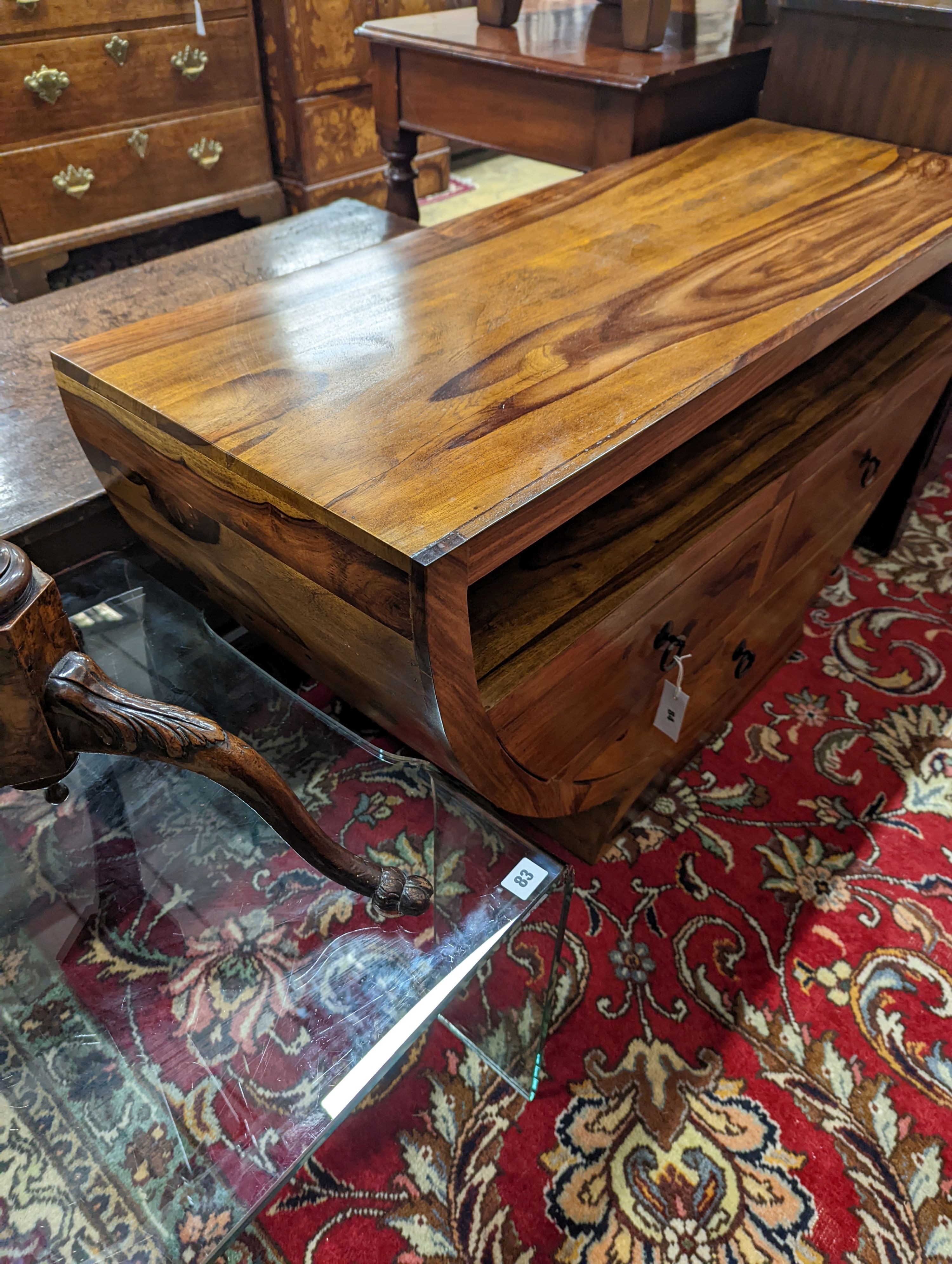 A modern sheesham three drawer 'U' shaped TV unit, width 120cm, depth 45cm, height 66cm